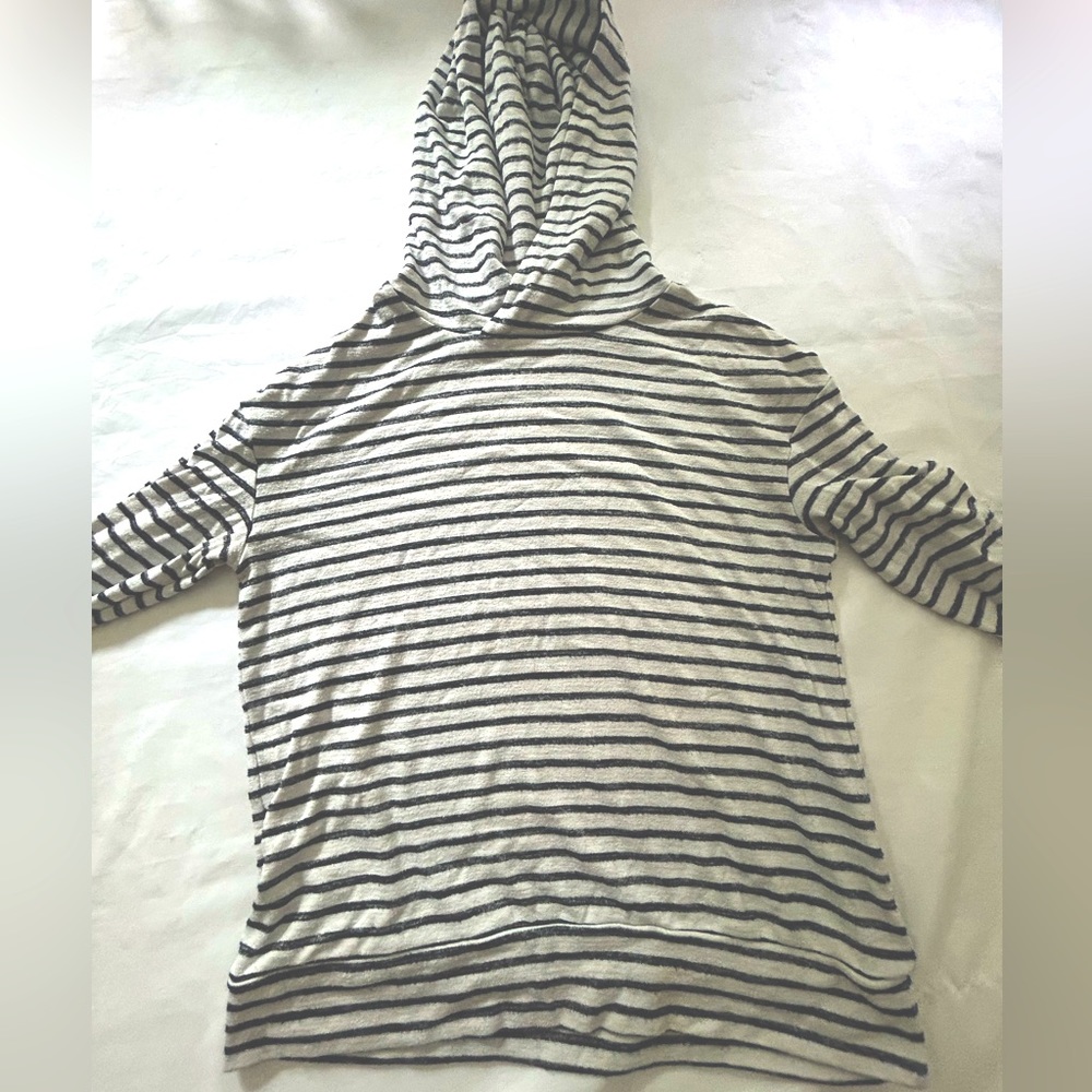 A new day white and black striped hoodie which feel almost like a thick tee.